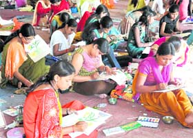 Students paint during an examination at Jwalapur Inter College in Haridwar