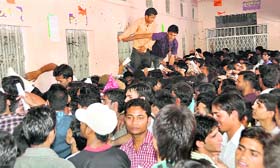 DAV College students in large numbers submit their application forms for supplementary examinations in Dehradun
