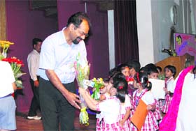 Brother AJ George, Principal, St Josephs Academy being greeted on his birthday by students in Dehradun