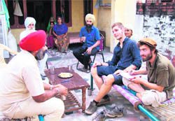 French tourists with Bahadur Singh and his family members.