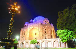 Khan-e-Khana at Nizamuddin is illuminated ahead of the Commonwealth Games in New Delhi 