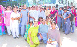 Students protest against the withdrawal of a special bus service in Sirsa 