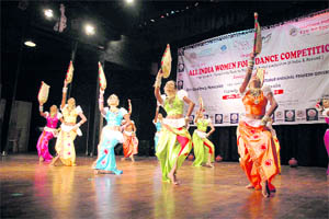 Students from Sri Lanka perform a traditional dance during All-India Women Folk Dance Competition at Gaiety Theatre in Shimla on Wednesday. Girls from various Indian states and abroad are participating in the event which will conclude on October 2.