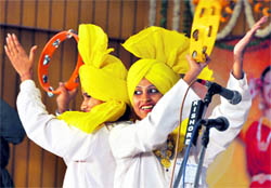 Students perform a group folk orchestra during a musical contest at PU youth festival in Ludhiana on Wednesday