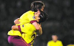 Arsenals Tomas Rosciky (L) and Maroune Chgamakh celebrate the second goal on Tuesday.