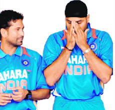 Sachin Tendulkar shares a light moment with Harbhajan Singh