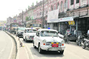 A flag march being taken out in Dehradun on Thursday. 