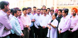 Members of the special dengue squad of an NGO interact with the Blood Transfusion Officer (BTO) Dr Amarjit Kaur, at the blood bank in the DMCH in Ludhiana.