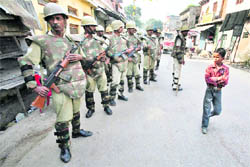 Policeman stand on guard in Ayodhya