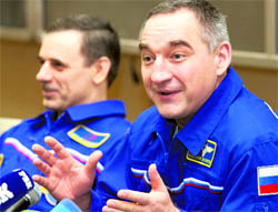 Russian cosmonauts Alexander Skvortsov (R) and Mikhail Korniyenko at a news conference at the Star City space centre outside Moscow, on September 27, 2010. A Soyuz capsule carrying the two cosmonauts and a U.S. astronaut from the International Space Station landed safely in Kazakhstan last Saturday