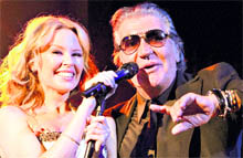 Australian singer Kylie Minogue and Italian designer Roberto Cavalli during the 40th anniversary of Roberto Cavallis brand, in Paris, on Wednesday