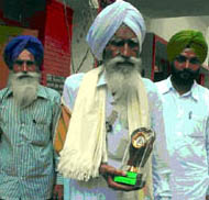 Mukhtiar Singh of Kotha Guru was among those honoured by the District Social Security Office in Bathinda on Friday