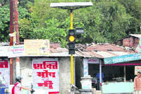 A solar traffic light installed at an intersection in Dehradun. A Tribune photograph