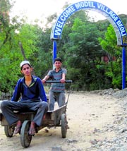 Boys on a joy ride at the entrance of Beoli village in Doda.