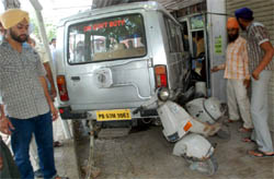 A vehicle on government duty rammed into a studio on the Bibiwala road in Bathinda on Saturday
