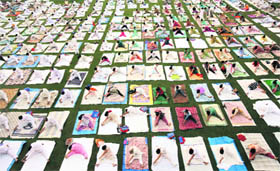 Residents participate in an early morning yoga session in Chandigarh on Saturday.