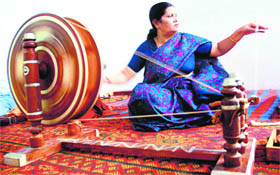 A woman tries her hand at spinning on a swadeshi charkha at Gandhi Smarak Bhawan, Sector 16, to mark the birth anniversary of the Father of the Nation, in Chandigarh on Saturday.