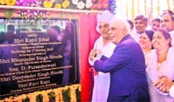 Union HRD Minister lays the foundation stone of IIM at Garnawathi village in Rohtak on Friday.