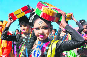  Girls in traditional attire participate in an awareness rally on Save Girl Child in Shimla on Saturday. 