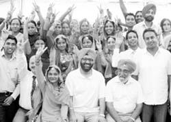 Students with Kilaraipur MLA Jasbir Singh Khangura at Latala village near Mandi Ahmedgarh on Saturday
