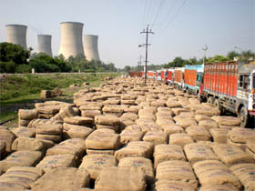 Chaos prevailed on the Santpura road that leads from the Sirhind canal to the railway station along the rail track after hundreds of bales of gunny bags for paddy procurement were unloaded there on Sunday. With trucks also parked on the road, commuters found themselves at the receiving end.