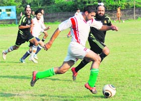 A match between BSNL and Friends Football Club in progress at football stadium, Sector 17, Chandigarh