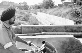 Stalled work on the choe at Damesh Nagar causes inconvenience to residents in Kharar