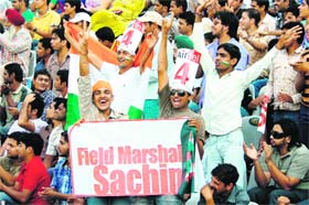Cricket lovers in a jubilant mood during the India-Australia Test match at Mohali