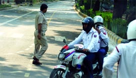 A deserted road near Jawaharlal Nehru Stadium in New Delhi on Sunday.