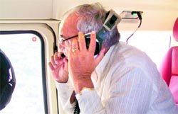 Chief Minister BS Hooda undertakes an aerial survey of flood-hit areas of Jhajjar on Sunday.