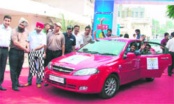 A car rally being flagged off at Ludhiana on Sunday. 