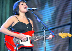 Norah Jones performs during the 25th anniversary Farm Aid concert in Milwaukee on Saturday
