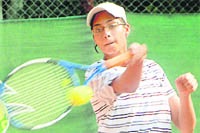 A player in action during the LD Kapoor Memorial Tennis U-18 Tournament at YMCA in Sector 11, Chandigarh. Tribune photo: Vinay Malik