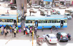 Buses halt on the highway at Zirakpur causing traffic jam.
