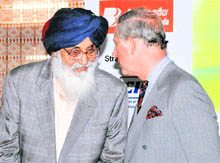 Punjab Chief Minister Parkash Singh Badal with Prince Charles at a function at Punjab Raj Bhavan in Chandigarh on Monday.