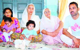Terrorism victim Asha Rani (second from left) with her family in Amritsar