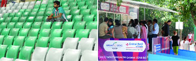 (Left) A volunteer sits in the empty stands at Major Dhyan Chand National Stadium in New Delhi on Tuesday. (Right) People buy tickets outside the Yamuna Sports Complex on Tuesday.