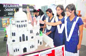 Students watch a model at a social science exhibition held at Kendriya Vidyalaya, FRI, in Dehradun
