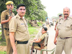 Policemen deployed at New Grain Market in Karnal.