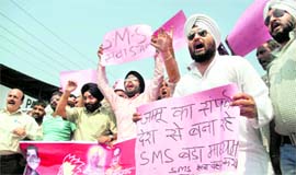 Activists of the Kranti Dal protest against the ban on SMS in Jammu on Tuesday.