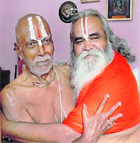 MEETING AFTER 24 YEARS: Former MP Ram Vilas Vedanti meets chief of Nirmohi Akhara Mahant Bhaskardas to discuss the construction of Ram temple in Ayodhya on Tuesday. 