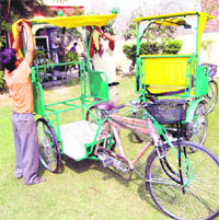The newly launched eco-friendly rickshaw being assembled on the premises of the Red Cross Bhawan in Amritsar