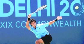 India's Somdev Devvarman in action against Bahamas's Devin Mullings during the first round of men's singles tennis event of the Commonwealth Games at R K Khanna Tennis Stadium in New Delhi