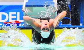 Englands Gemma Spoforth competes in a heat of the Women's 100 metre backstroke