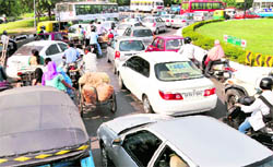 Motorists stranded at the Tribune roundabout in Chandigarh on Wednesday