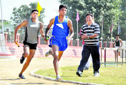 Athletes participate in the Eighth Inter-District Police Athletics Championship-2010 held at the Police Lines in Dehradun on Wednesday