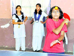 A player in action at the Inter Council Schools Junior Girls Table Tennis Tournament being held in Dehradun on Wednesday