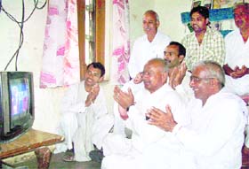 Villagers celebrate the victory of Rajender in Kurukshetra