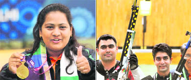 Anisa Sayyed shows her gold medal after winning the womens 25m pistol (singles) event; Gold medallist shooter Gagan Narang (L) with silver medallist Abhinav Bindra.
