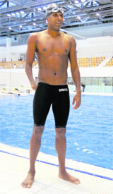 Prashant Karmakar, whose right arm is amputated, won a bronze for India in the para swimming S9 category in New Delhi. 